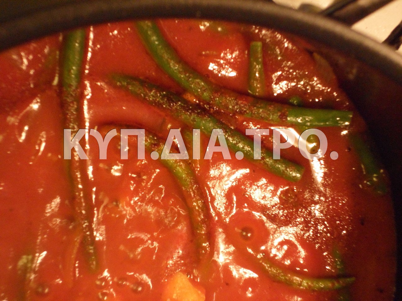 Φασολάκι σε σάλτσα ντομάτας. <br/> Πηγή: https://commons.wikimedia.org/wiki/File:Green_beans_in_tomato_sauce.jpg 
